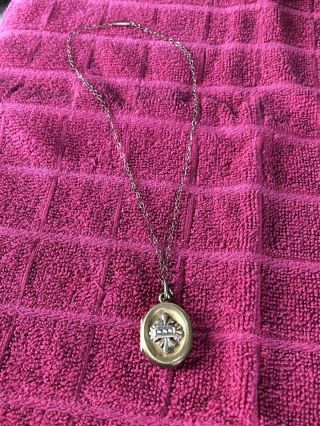Antique Vintage Gold Tone Locket With Old Pictures Inside Cleaning Out
