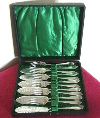 Antique Cased Set Of Silver Plated Fish Knives & Forks.