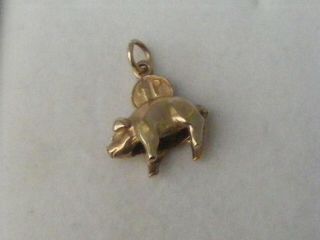 A Very Rare 9ct.  Articulated Piggy Bank,  Coin Goes Into A Pig.  Charm,  3.  5grms