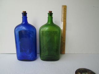 two antique labeled ammonia bottles 9.  5 in tall blue&green norfolk va.  & buffalo 3