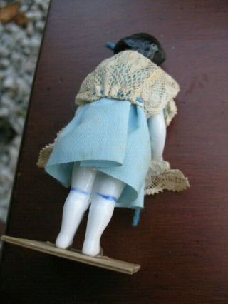 3 antique German china shoulder head dolls with cloth body 3 1/2 4 4 1/2 high 3