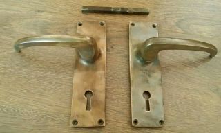 A Reclaimed Vintage Brass / Copper Spring Loaded Door Handles Keyholes