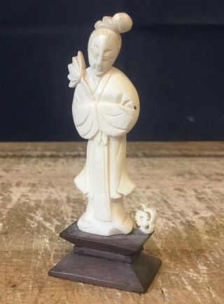 Antique Small Indian Carved Figure Of A Lady Holding A Flower On Plinth