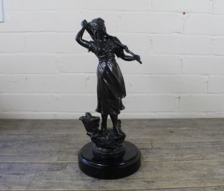 Vintage Spelter Figure Of Fishing Girl With Net On Plinth Wooden Base.