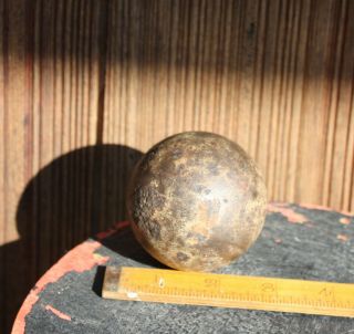 CANNON BALL ANTIQUE CAST IRON Small 2.  5 inch Dia.  Weight 2.  4 pounds. 2