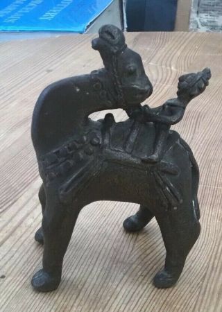 Unusual 19th Century Indian Brass Figure Of A Man Riding A Camel.