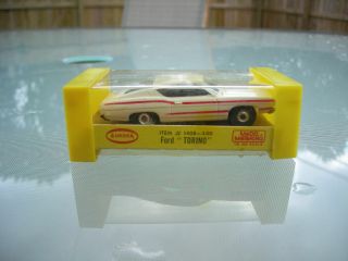 AURORA - T/JET VERY RARE FORD TORINO IN WHITE/RED STRIPES IN THE BOX COMPLETE 2