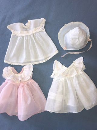 Three Vintage Doll Dresses,  One Bonnet For A Compo Or Hard Plastic Doll
