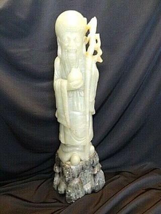 Jade Sculpture: Chinese Man With Walking Stick - Mounted On Stone
