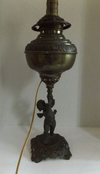 Antique Juno Converted Oil Lamp With Winged Cherub Putti Base