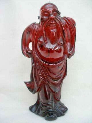 Rare Vintage Cherry Amber Bakelite Figure Of A Chinese Sage.