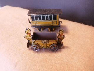 2 Antique Tin Litho Penny Toys 2 Man Coal Car Wire Wheels & Passenger Car Tin