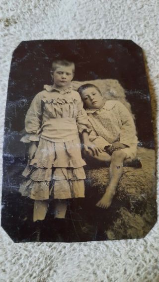Antique Tintype Photograph Of Seated Barefoot Boy And Sister