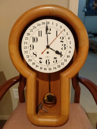 Rare Solid Oak Howard Miller Keywound Wall Clock Designed By Arthur Umanoff