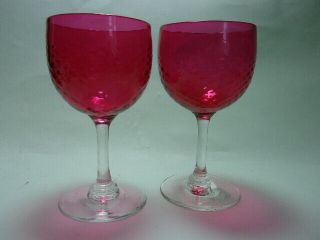 A Antique Cranberry Wine Glasses.