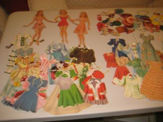 Three Alice Faye Paper Dolls With Clothing And Accessories