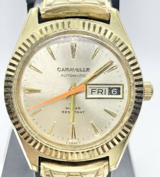 Vintage Caravelle Gold Tone Day - Date Watch