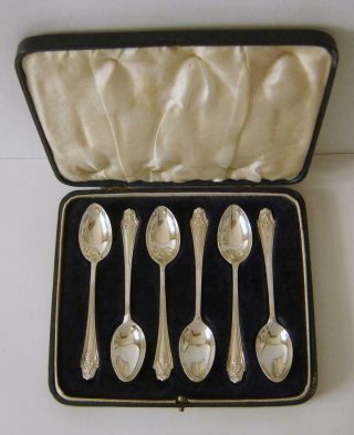 A Cased Set Of Six Ornately Embossed Sterling Silver 10 Cms Spoons London 1927