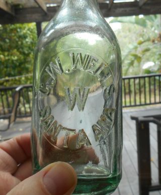 Antique c.  1900s embossed soda bottle G.  W.  WELLS SANTA ANA (CA) MUG BASE 2