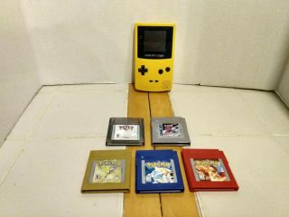 Rare Nintendo Gameboy Color With Games Pokemon Blue,  Red,  Gold Plus More
