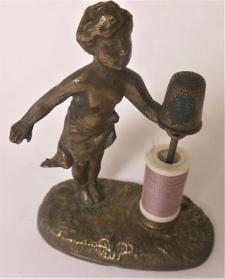 Great Antique Brass Figural Thread Holder,  Child Or Putti