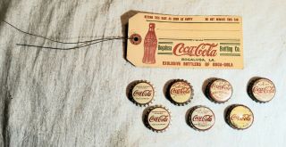 7 Vintage Coca Cola 6 Oz.  Bottle Caps & Bottle Case Tag From Bogalusa,  La