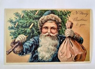 Antique Blue Coat Santa Carrying Tree With Toy Sack Emb Divided Postcard Germany