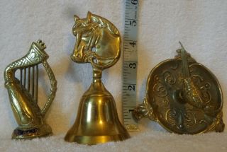 3 Vintage Brass Ornaments.  1 Bell With Horse Head 1harp And 1 Bird Ring Dish.