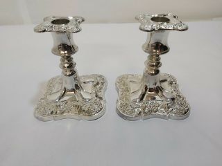 A Matching Vintage Victorian Style Silver Plated Candle Holders.  Embossed