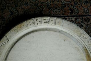 AN ENGLISH ANTIQUE HAND CARVED WOODEN BREAD BOARD 2