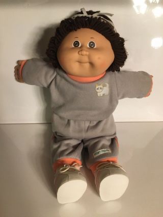 Vintage 1985 Cabbage Patch Kid Brown Eyes Brown Hair & One Dimple.  Cat Outfit