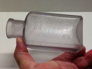 Antique Light Amethyst Tarrant & Co Druggist Bottle York.