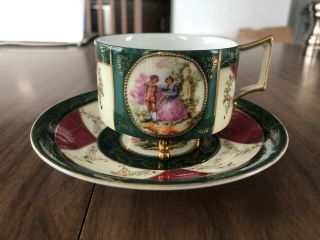 Hand Painted Occupied Japan Green,  White & Red Courting Scene Teacup And Saucer