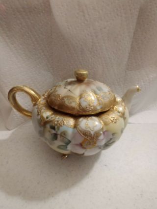 Antique Nippon Hand Painted Teapot With Flowers And Gold Trim.