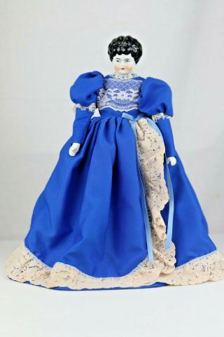 Antique China Head Shoulder Head Doll With Molded Black Hair Blue Eyes