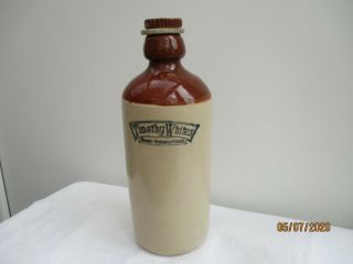 An Antique Vintage Stoneware Timothy Whites Stores Foot Warmer Hot Water Bottle.