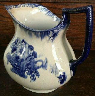 Large Antique Flow Blue Pitcher 8.  25 " H X 9.  5 " W Vase Unmarked