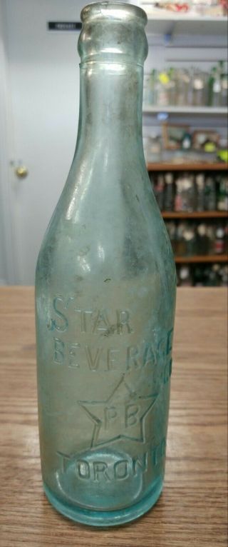Antique Star Beverages Toronto Ont.  Blue Tint Soda Bottle