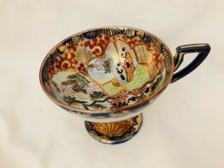ANTIQUE JAPANESE KUTANI HIGH FOOTED TEA CUP AND SAUCER GOLD/MULTICOLOR 2