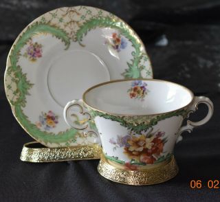 Vintage Austria Two Handled Porcelian Cup And Saucer