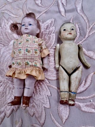 2 Vintage Bisque Dolls A Boy 4 1/4 " & A Girl 5 1/4 " With Moveable Arms & Legs