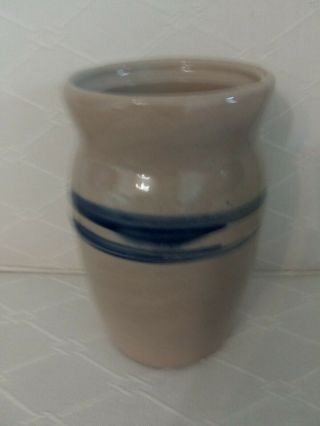 vintage stoneware crock with blue strips 6 ins.  tall 2