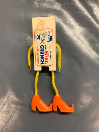 Vintage Nestle ' s Crunch candy bar man plastic toy figure all thumbs RARE 3