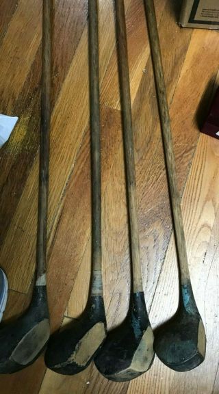 FOUR ANTIQUE WOODS WITH WOODEN SHAFTS - - - - - - - - - - - - - - - - - - - - - - - - - - - - - - - - - - - - - - - bk 3