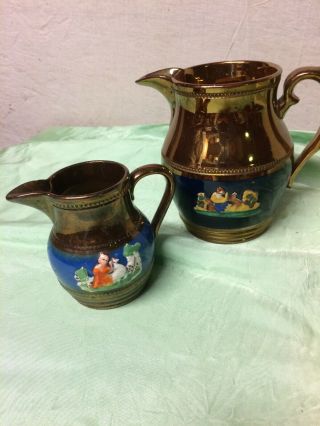 Copper Lustre Jugs With Relief Molded Figures Beaded Bands 2