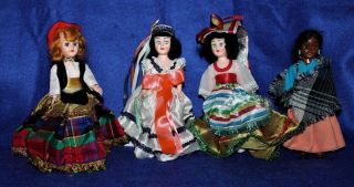 4 Vintage 7.  5 Inch Plastic Heritage Dolls