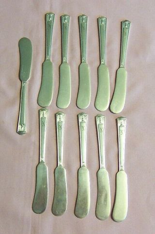 11 Holmes and Edward Silverplate Butter knives in the Century pattern1923. 2
