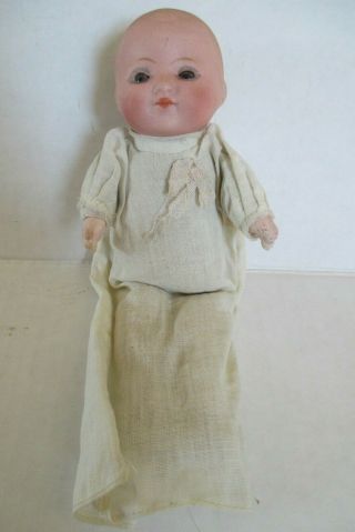 Antique German Bisque And Cloth Baby Doll With Sleep Eyes And Gown
