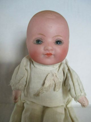Antique German Bisque and Cloth Baby Doll with Sleep Eyes and Gown 2