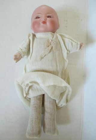 Antique German Bisque and Cloth Baby Doll with Sleep Eyes and Gown 3
